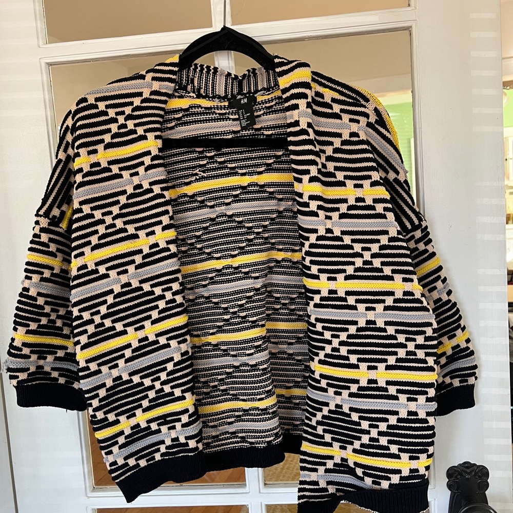 H&M patterned shrug cardigan, black and white pattern with yellow and blue